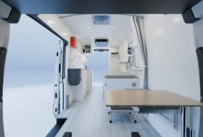 Exam table and medical equipment inside a Vanna mobile clinic